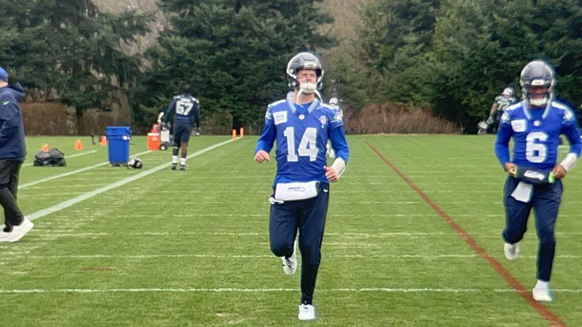 Quarterback Sam Darnold warms up to begin practice Thursday, Jan. 15, 2026, at the Virginia Mason Athletic Center in Renton, two days before he and his Seattle Seahawks host the San Francisco 49ers in an NFC divisional playoff game at Lumen Field.