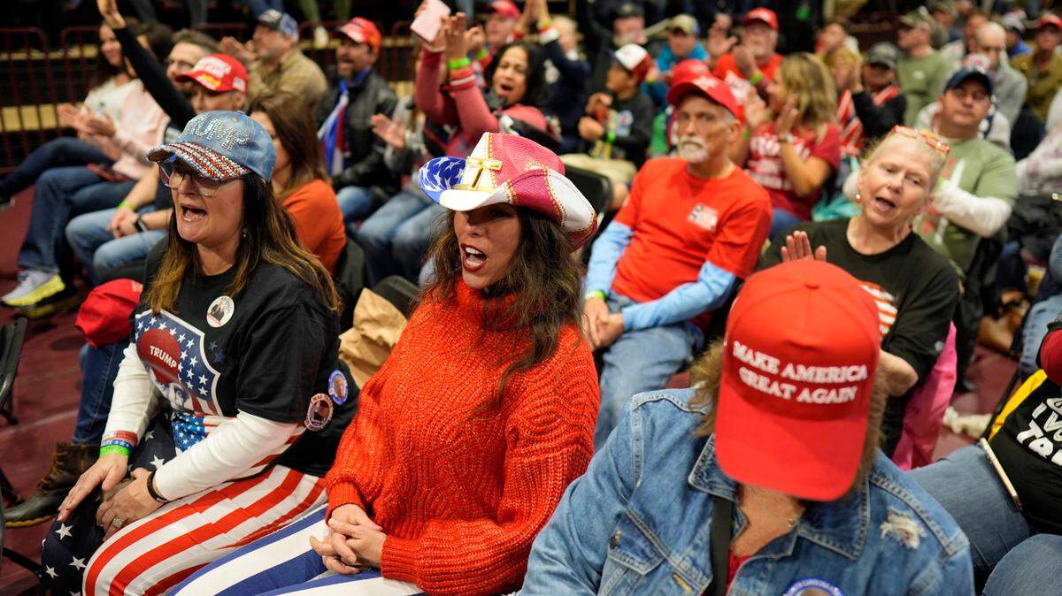 People arrive before Republican presidential candidate former President Donald Trump speaks at a campaign rally Friday, Feb. 23, 2024, in Rock Hill, S.C. (AP Photo/Chris Carlson)