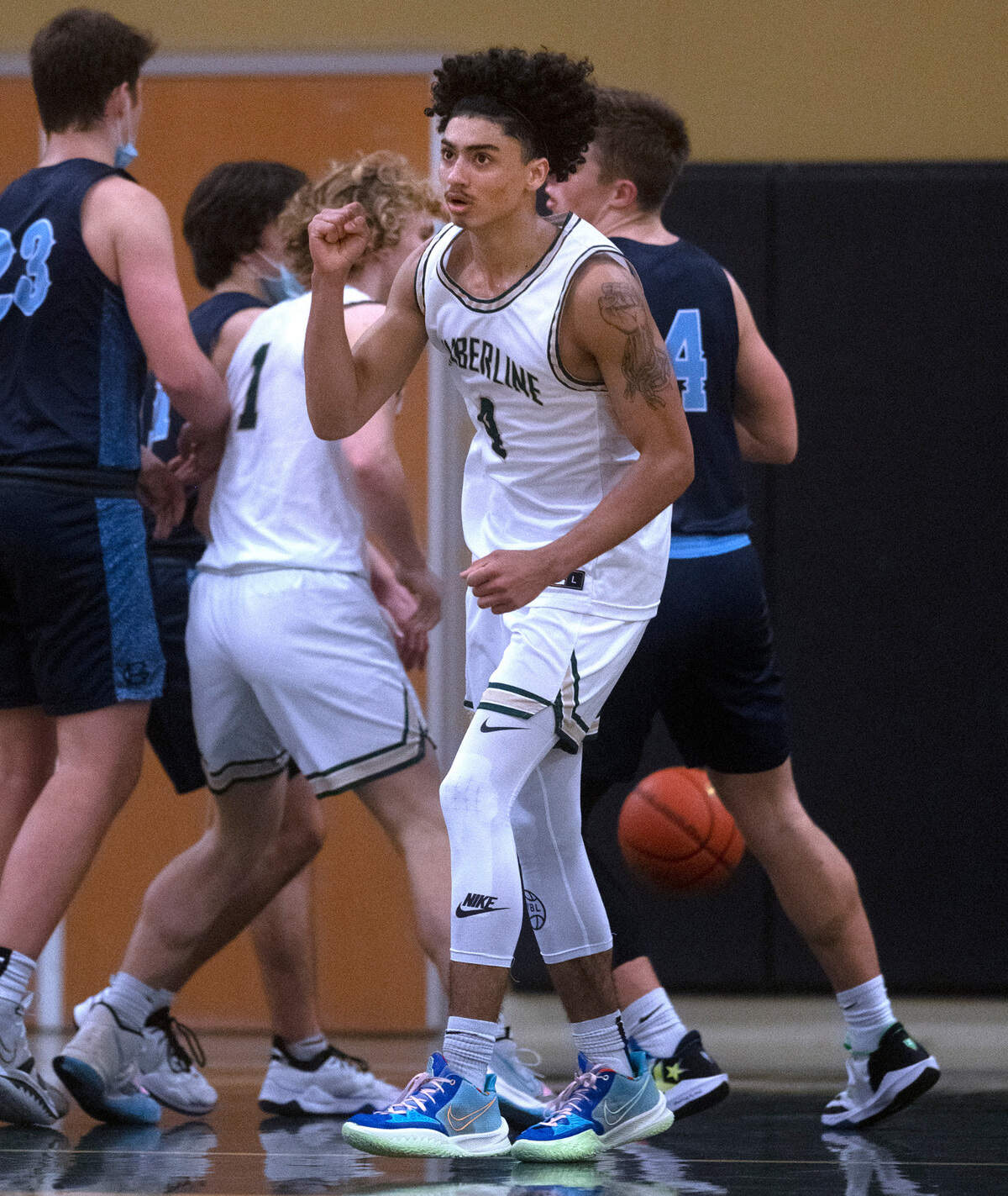 Timberline’s Brooklyn Hicks pumps his fist after scoring to give the Blazers their first lead of the game late in Friday night’s 3A South Sound Conference boys basketball game against the Gig Harbor Tides at Timberline High School in Lacey, Washington, on Jan. 14, 2022. Timberline rallied for the come-from-behind victory, 60-57.