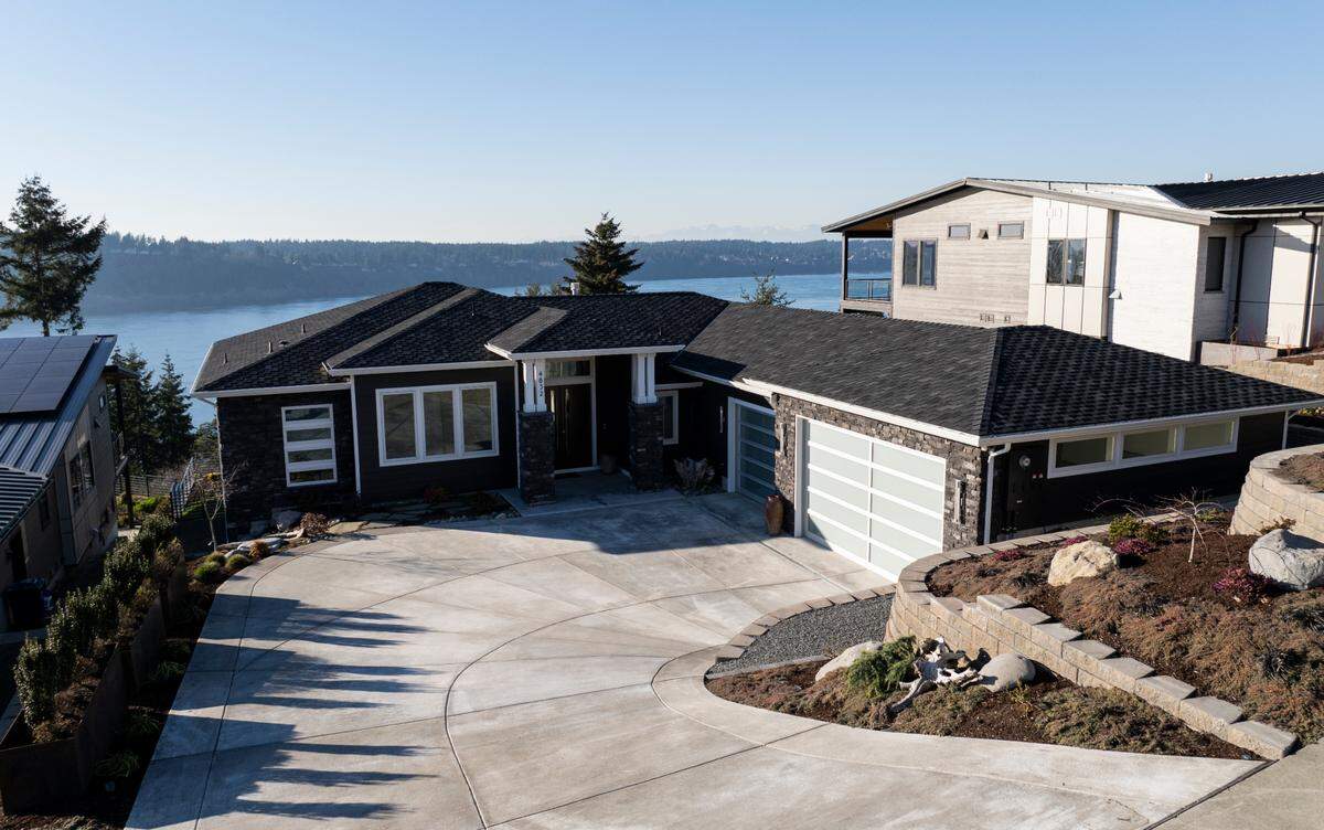 A sweeping view of the Olympic Mountains, Gig Harbor, the Tacoma Narrows Bridge and modern amenities are featured in this home on the market from Rush Residential, on Wednesday, Jan. 29, 2025, in Tacoma.