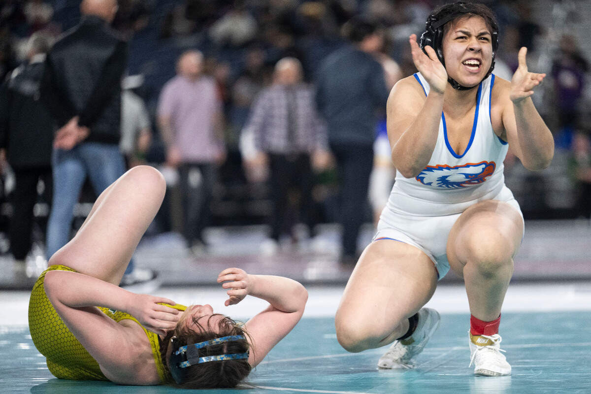 Graham-Kapowsin’s Selena Mares-Castro celebrates after defeating Auburn’s Lysandra Plant to win the Class 4A, 170-pound championship on Friday, Feb. 21, 2025, at Mat Classic XXXVI at the Tacoma Dome in Tacoma, Wash.