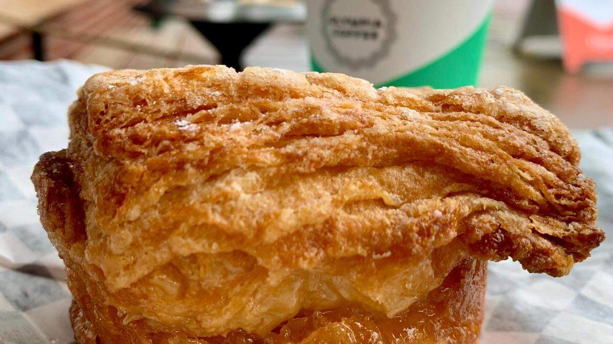The kouign-amann from Moonrise Bakery, produced in Seattle but available at all Olympia Coffee cafes, is as buttery as the traditional Breton pastry comes.