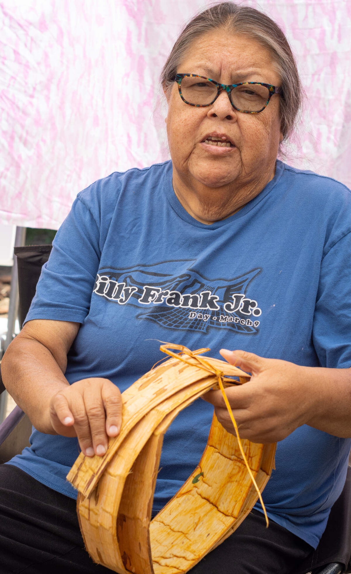 Puyallup tribal elder and culture director Connie McCloud, whose traditional name is Cedar Moon Woman, discusses the purpose and sacredness of cedar at the Puyallup Tribe of Indian’s cedar harvest Tuesday, June 29, in the Elbe Hills State Forest in eastern Pierce County. The tribe’s cultural center, located in Tacoma, hosts harvests of cedar and other summer plants once a week in June and July. The bark is harvested at the beginning of the summer, cleaned and left to dry for a year before it is used to make cedar hats, regalia and other cultural items.
