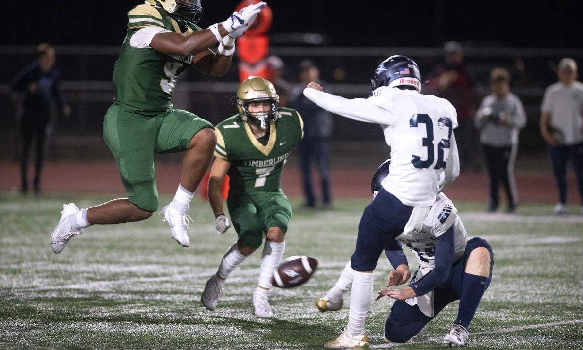 Timberline defender Darrell Gipson Jr. blocks a field goal attempt by Gig Harbor kicker Boone Leverett during Friday night’s football game at South Sound Stadium in Lacey, Washington, on Sept. 29, 2023. Gig Harbor won the game with a touchdown in the final minute, 17-14.