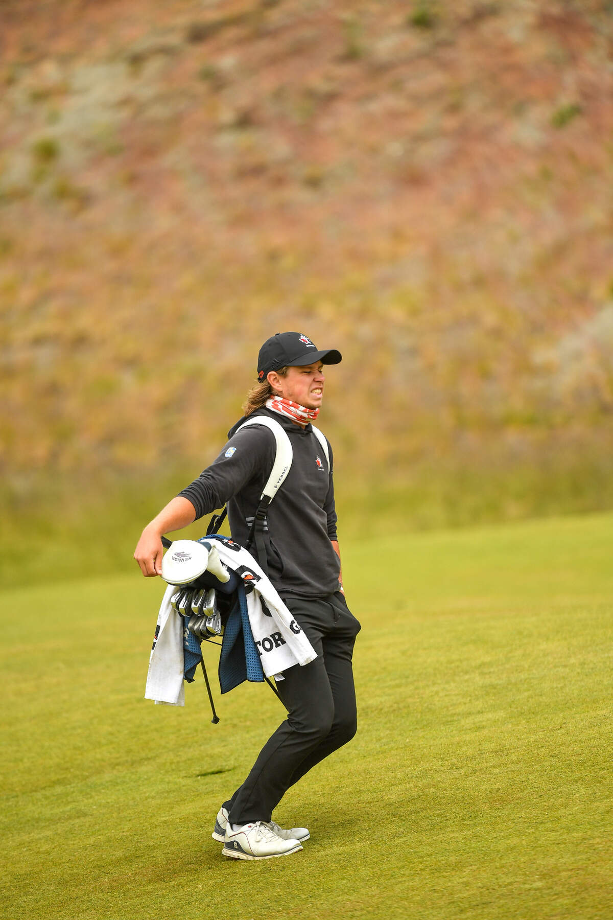 Brendan Macdougall reacts to his shot to the eighth hole during the round of 32 at the 2021 U.S. Amateur Four-Ball at Chambers Bay in University Place, Wash. on Monday, May 24, 2021. (Robert Beck/USGA)