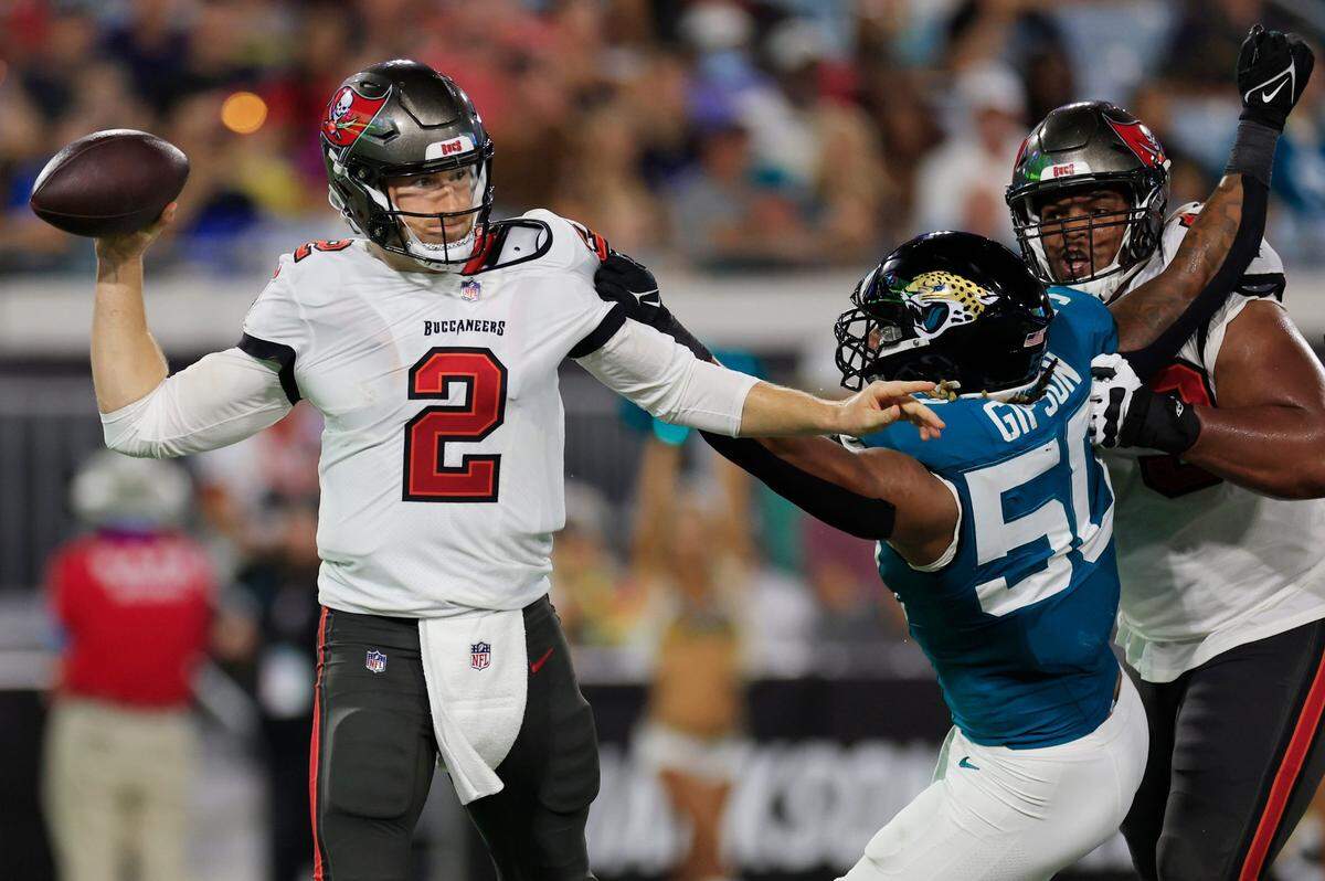 Jacksonville Jaguars defensive end Trevis Gipson (50) pressures Tampa Bay Buccaneers quarterback Kyle Trask (2) during the second quarter of a preseason NFL football game Saturday, Aug. 17, 2024 at EverBank Stadium in Jacksonville, Fla. The Jacksonville Jaguars defeated the Tampa Bay Buccaneers 20-7. [Corey Perrine/Florida Times-Union]