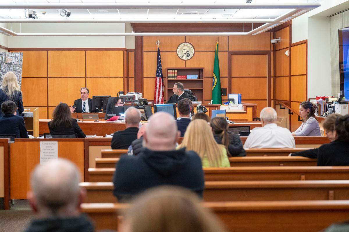 Nearly two dozen observers came to a Pierce County District Court room to hear the testimony of Pierce County Sheriff Ed Troyer on Thursday, Dec. 8, 2022, in Tacoma, Wash.