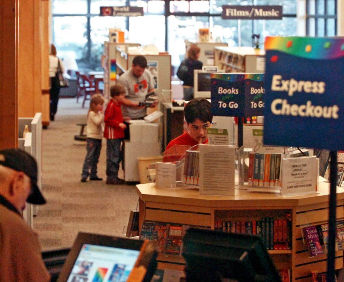 Patrons visit the Pierce County Library South Hill branch in 2011.