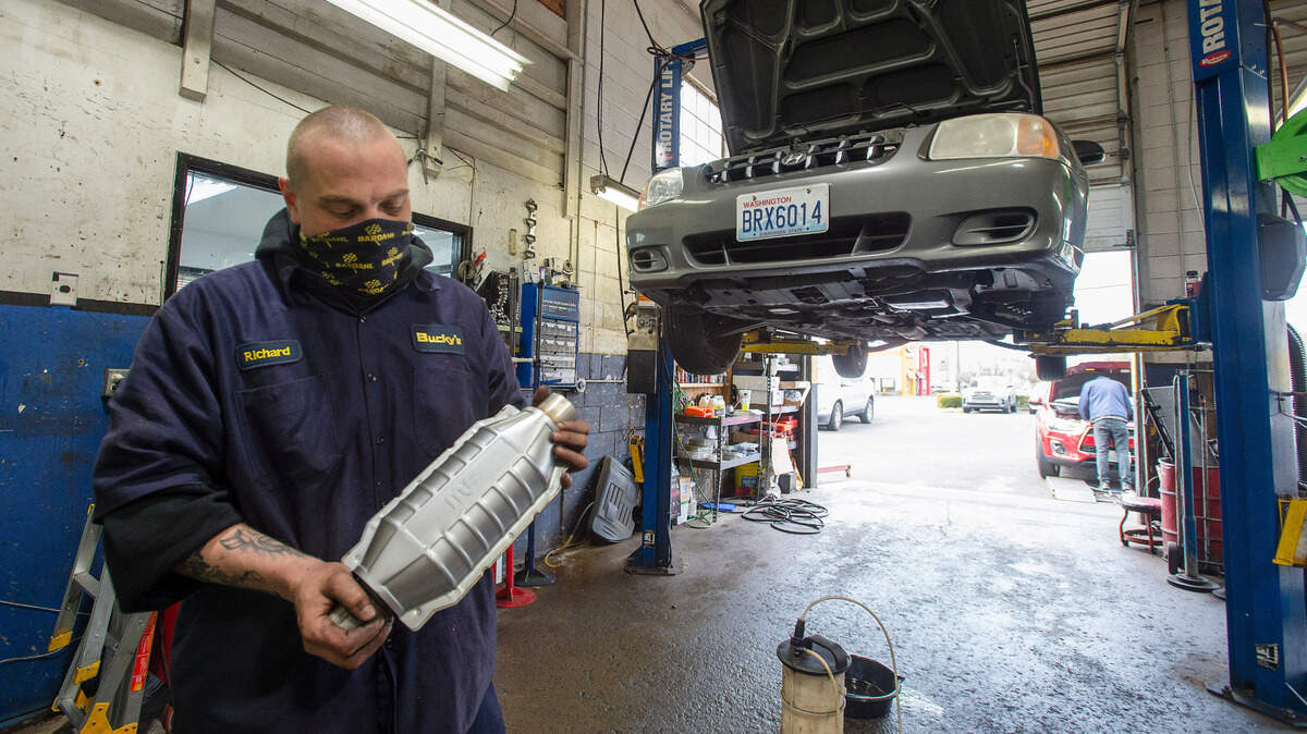 Richard Robinson, a mechanic at Bucky’s Complete Auto Repair in Tacoma, says in March 2021 that their shop sees about 4-5 customers per week who’ve had their catalytic converters stolen. Basically, the pollution devices contain valuable metals that can be recycled.