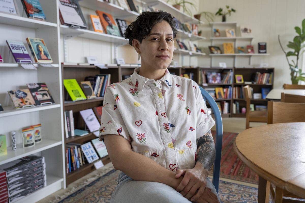 Chris Vega, the publisher, founder and owner of Blue Cactus Press, sits in the publishing houses' studio on Thursday, Feb. 26, 2026, in Tacoma, Wash.