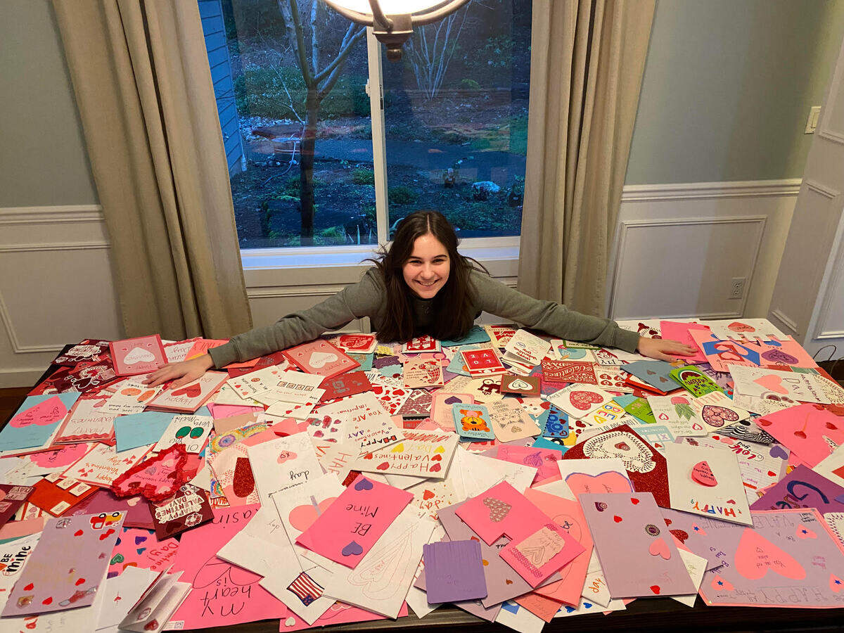Payton Danosky with all 415 handmade Valentine’s collected.