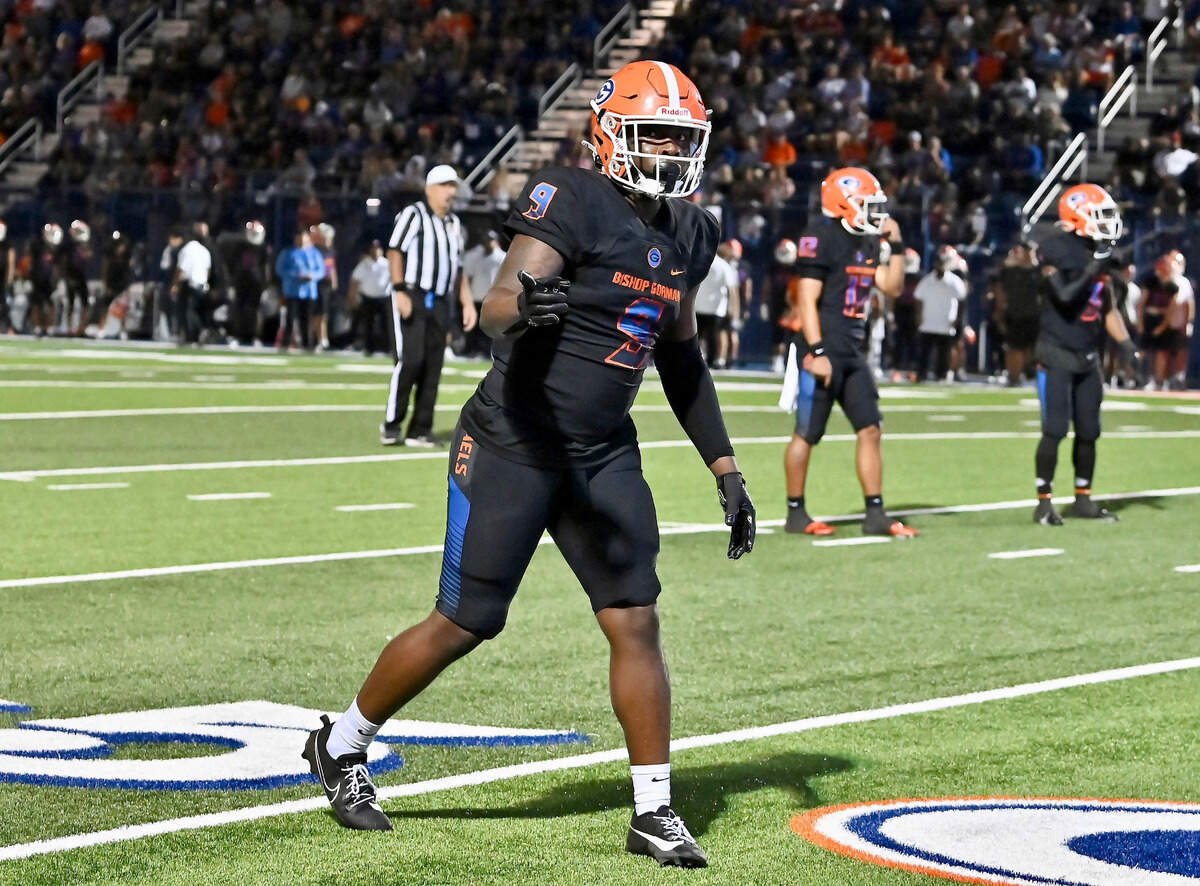 Bishop Gorman’s Elija Lofton (9).