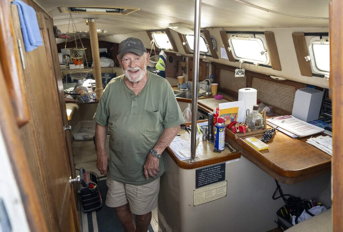 George W. Dockstader stands inside his houseboat, where he lives full time at Breakwater Marina, on Tuesday, May 12, 2026, in Tacoma, Wash.