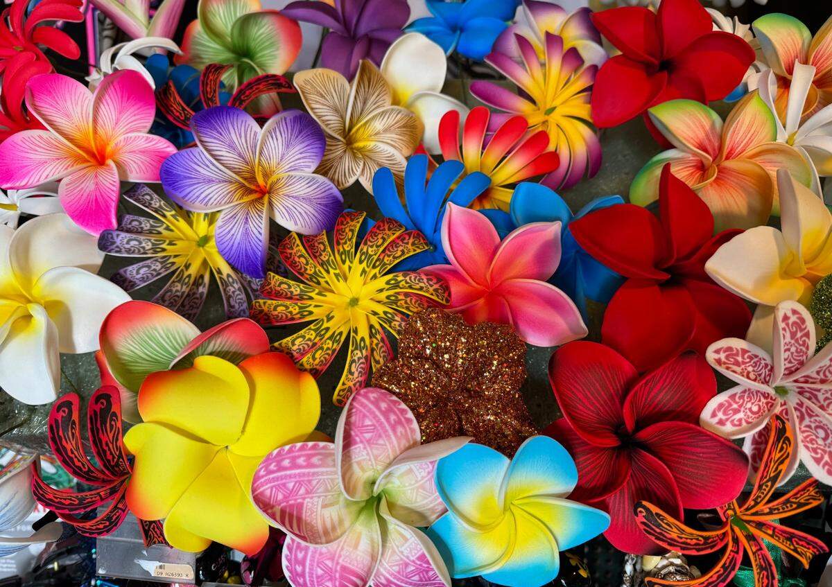 Tropical flower hair clips on display at Anita’s Hawaiian Boutique in Tacoma.