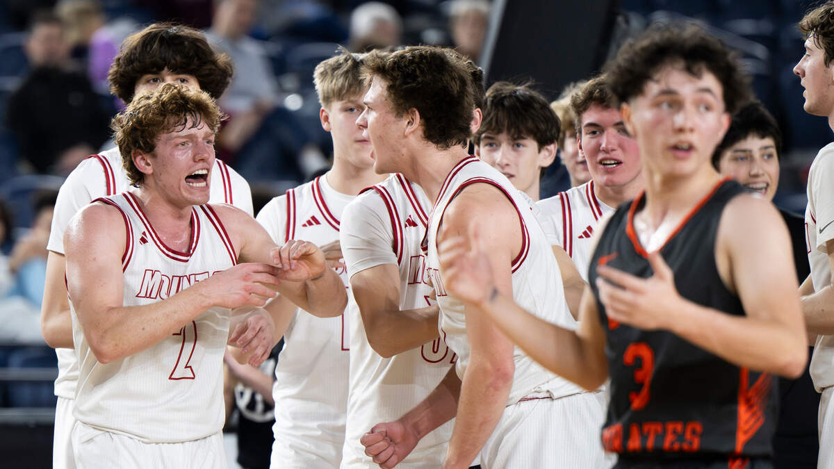 Mount Si Wildcats reacts to a three-point buzzer-beater to end the third quarter against Davis during the semifinals game of the Class 4A state tournament at the Tacoma Dome, on Friday, March 1, 2024, in Tacoma, Wash.