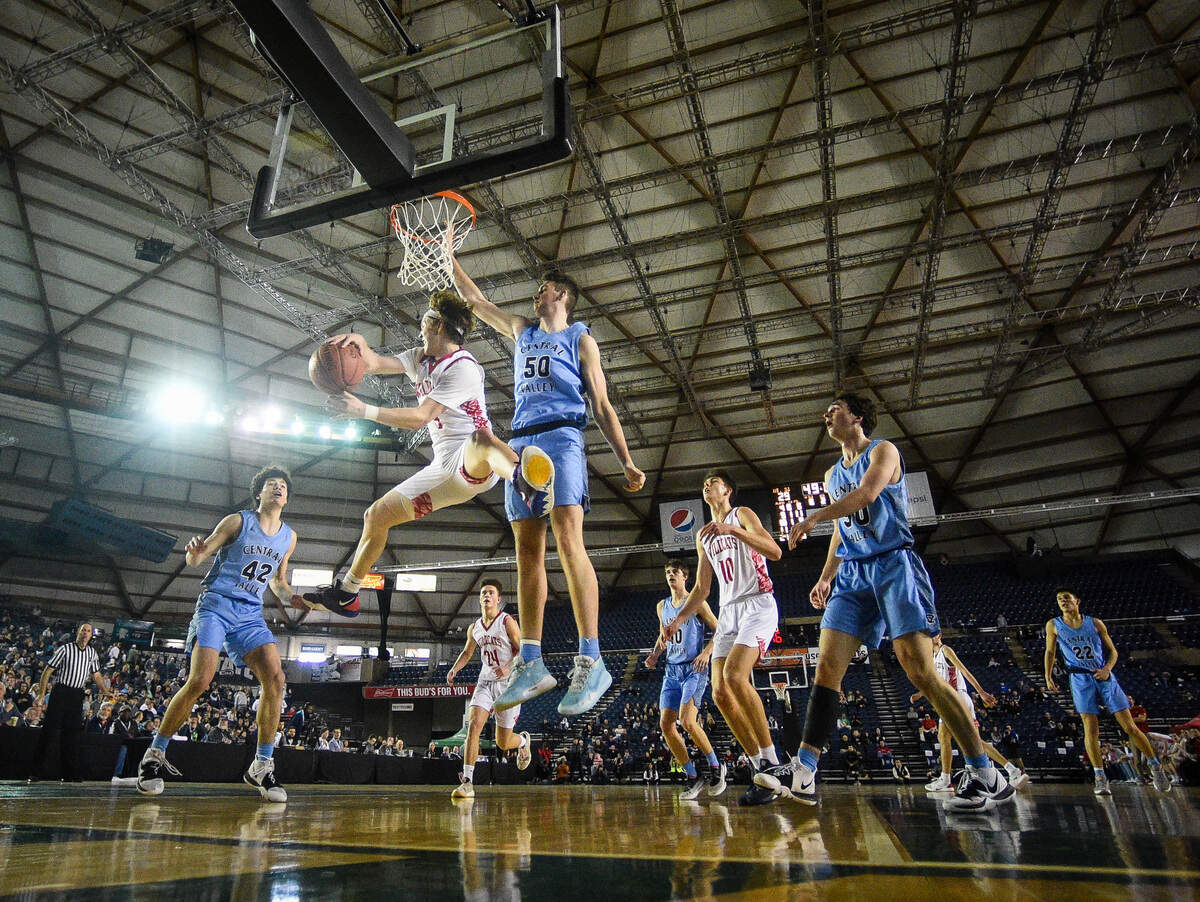Mount Si’s Bennett O’Connor passes out to a shooter during the second quarter. Mount Si played Central Valley in the 4A boys championship game at the Hardwood Classic state basketball tournament at the Tacoma Dome in Tacoma, Wash., on Saturday, March 7, 2020.