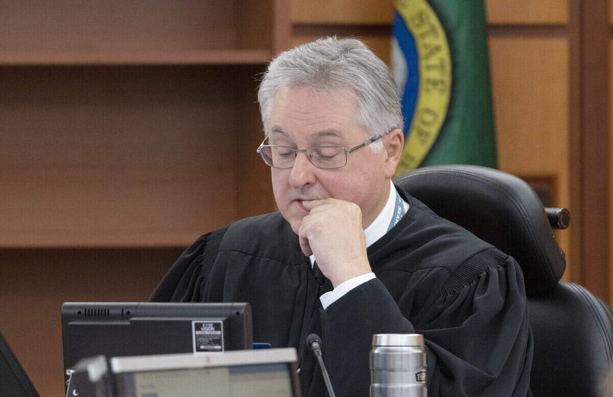 Pierce County Superior Court Judge Bryan Chushcoff presides over the trial of Tacoma Police officers accused in the death of Manny Ellis held at Pierce County Superior Court, Wednesday Nov. 8, 2023, in Tacoma, Wash. Officers Christopher Burbank, Matthew Collins and Timothy Rankine are charged with his death. (Ellen M. Banner / Pool / The Seattle Times)
