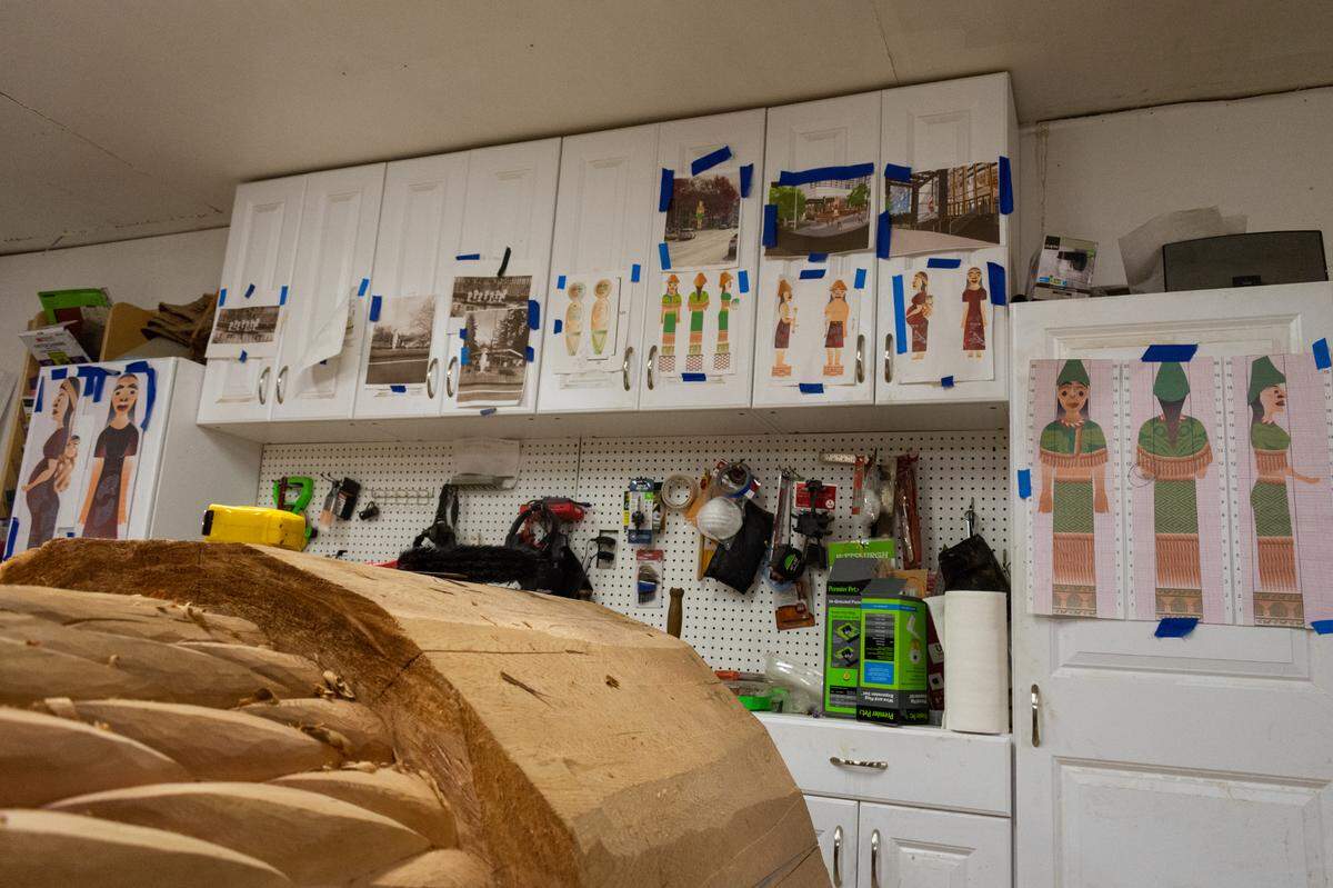 Mock-up designs and tools hang from the walls of Andrea Wilbur-Sigo’s Shelton, Wash., workshop on Thursday, Nov. 4. The carver and member of the Squaxin Island Tribe is known for large pieces of public art including welcome figures, house posts and spindle whorls as well as beading and weaving.