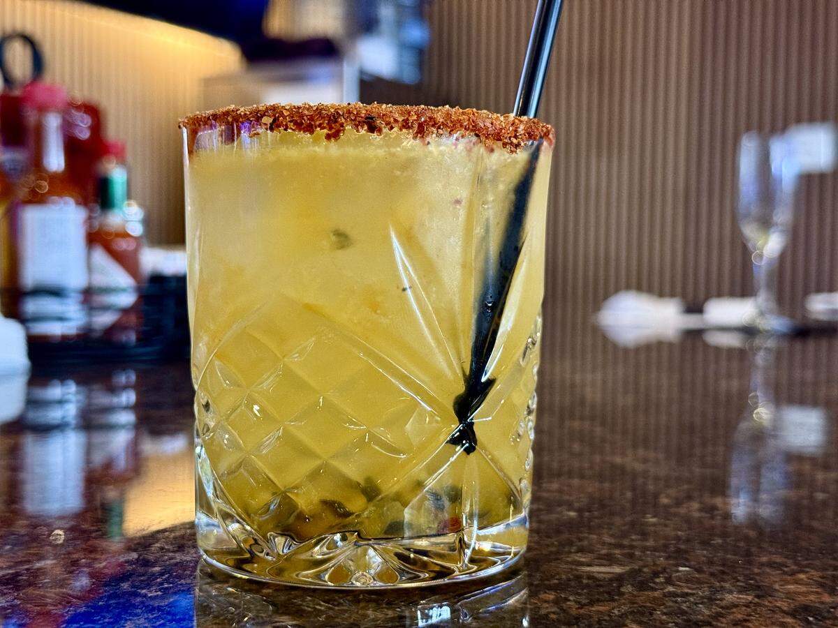 A passionfruit mezcalita is one of many fruit-forward cocktails at Casa de los Chilaquiles. Many guests opted for a mimosa flight, with fresh OJ, guava, mango and strawberry.
