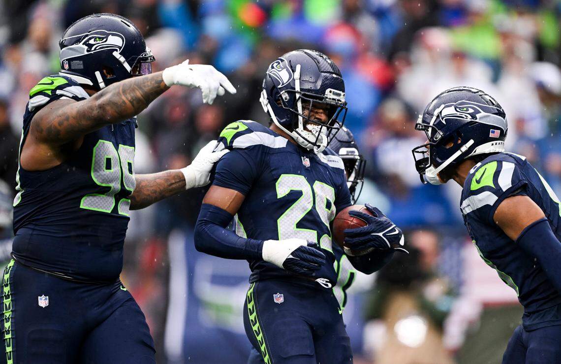 Seattle Seahawks cornerback Josh Jobe (29) reacts to a 35-yard interception return during the second quarter of the game against the Buffalo Bills at Lumen Field, on Sunday, Oct. 27, 2024 in Seattle, Wash.