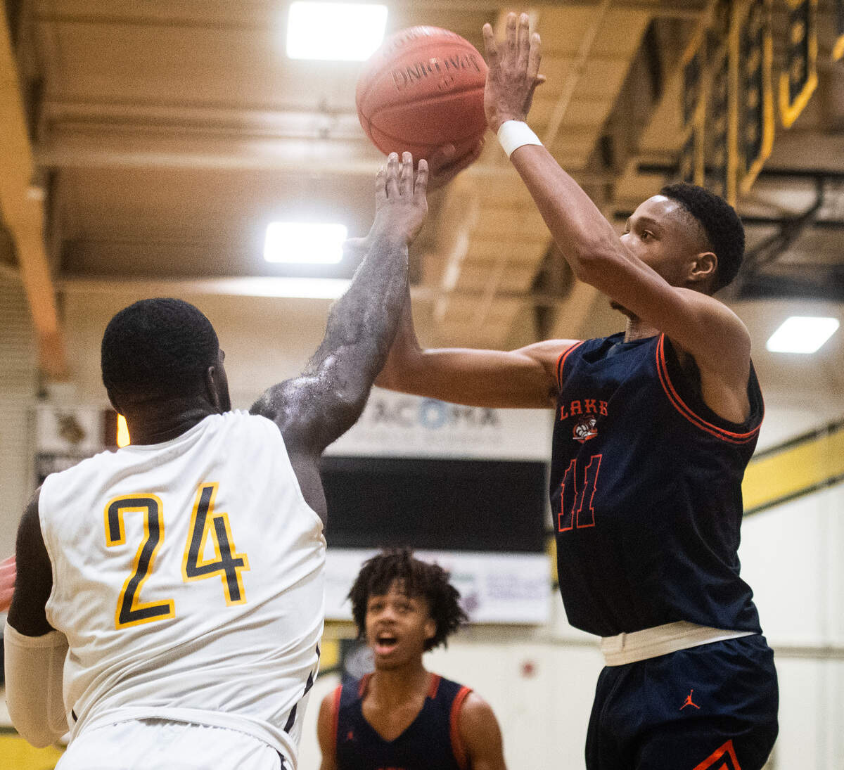Lakes’ Kenzel Massey shoots during the fourth quarter. Lakes played Lincoln in a basketball game at Lincoln High School in Tacoma, Wash., on Friday, Jan. 10, 2020.