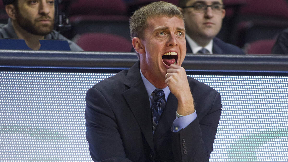 San Diego’s head coach Sam Scholl shouts to his players during the second half of an NCAA college basketball game against BYU in the quarterfinals of the West Coast Conference tournament, Saturday, March 3, 2018, in Las Vegas. (AP Photo/L.E. Baskow)