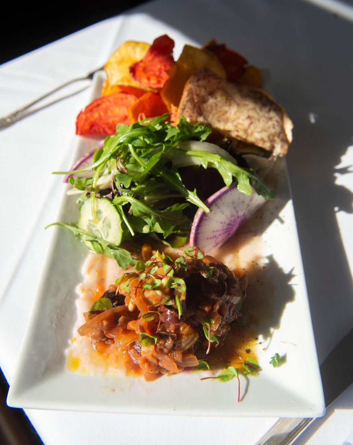 House-smoked and marinated seafood is a specialty of chef Giampaolo Falchetti at Crudo & Cotto in Tacoma’s Proctor District.