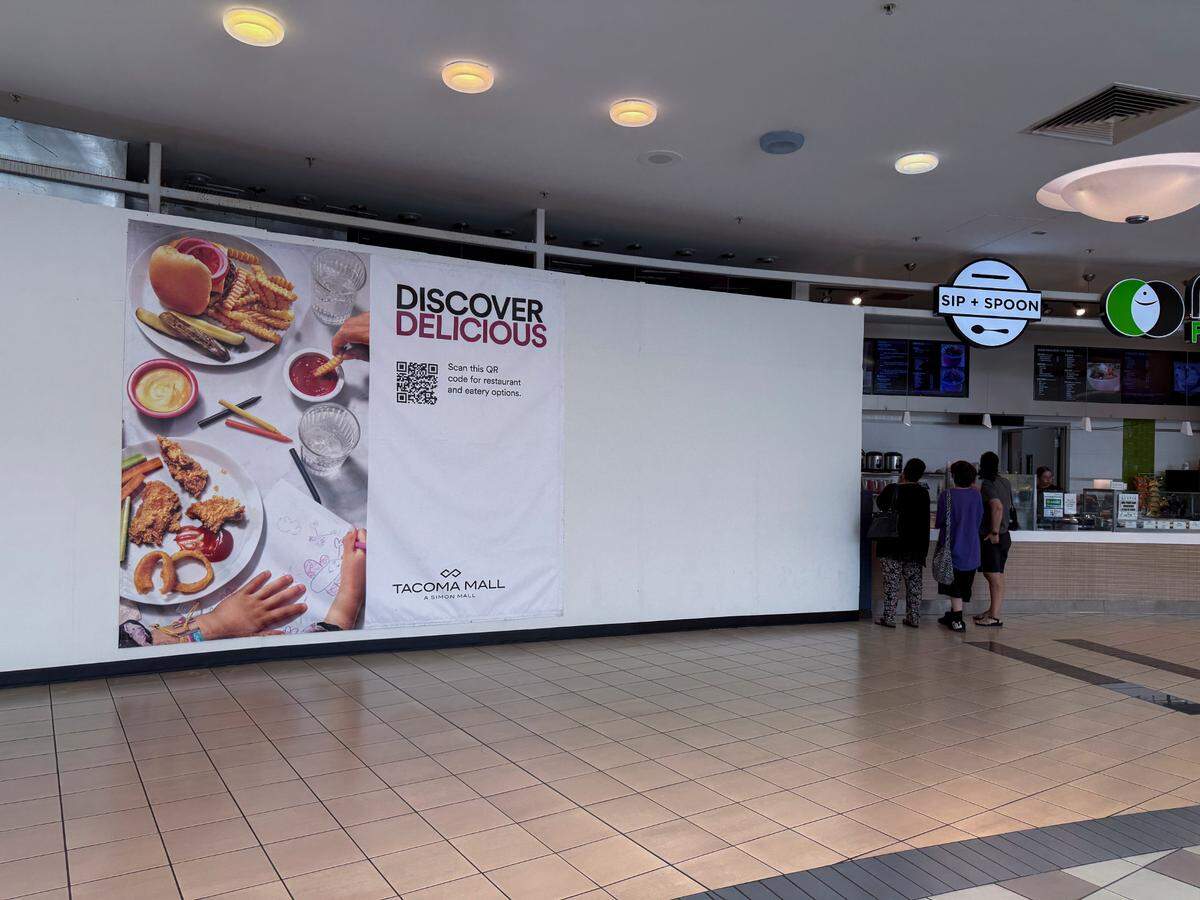 Signage hangs over the future location of Taco Street, according to the mall directory, at the Tacoma Mall Food Court, on Tuesday, June 3, 2025, in Tacoma, Wash.
