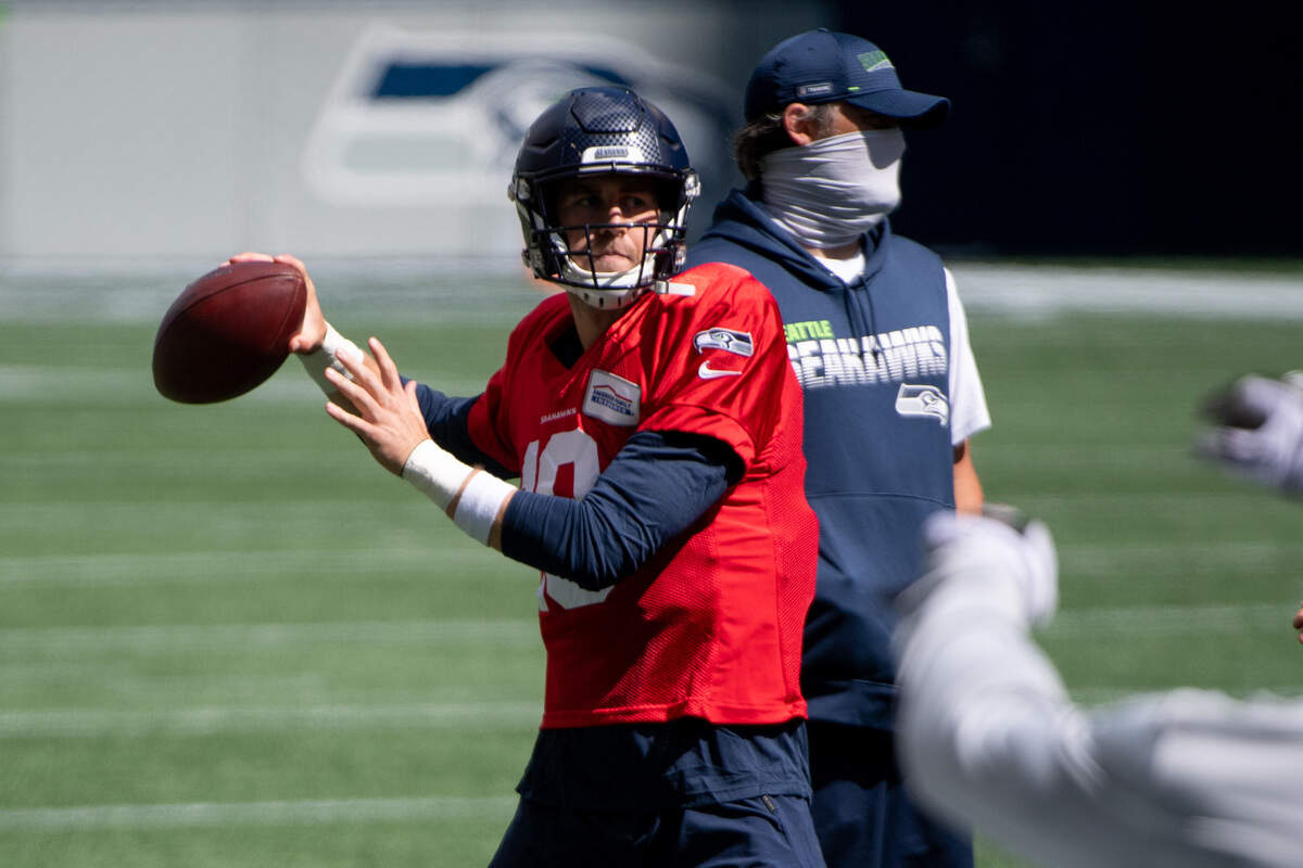 Danny Etling throws during warmups. The Seattle Seahawks held a practice game at CenturyLink Field in Seattle, Wash., on Saturday, Aug. 22, 2020.