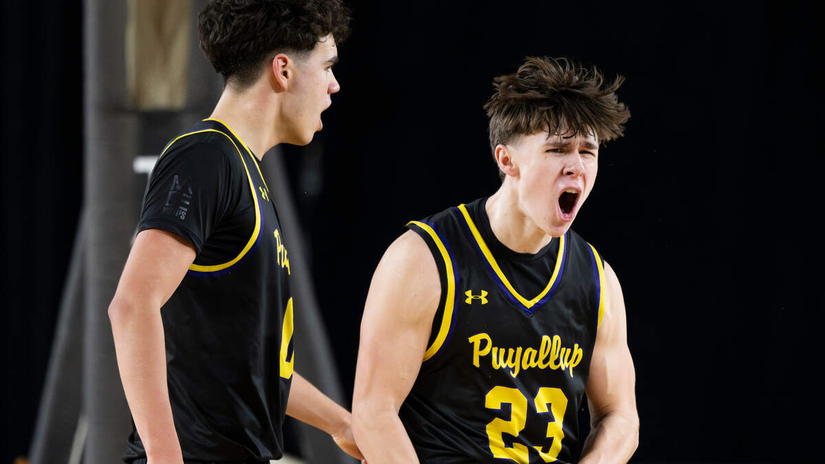 Puyallup’s Drew Jones (23) reacts to a foul on Mount Si during the second half of a Class 4A state basketball tournament quarterfinal game at the Tacoma Dome on Thursday, March 6, 2025, in Tacoma, Wash.