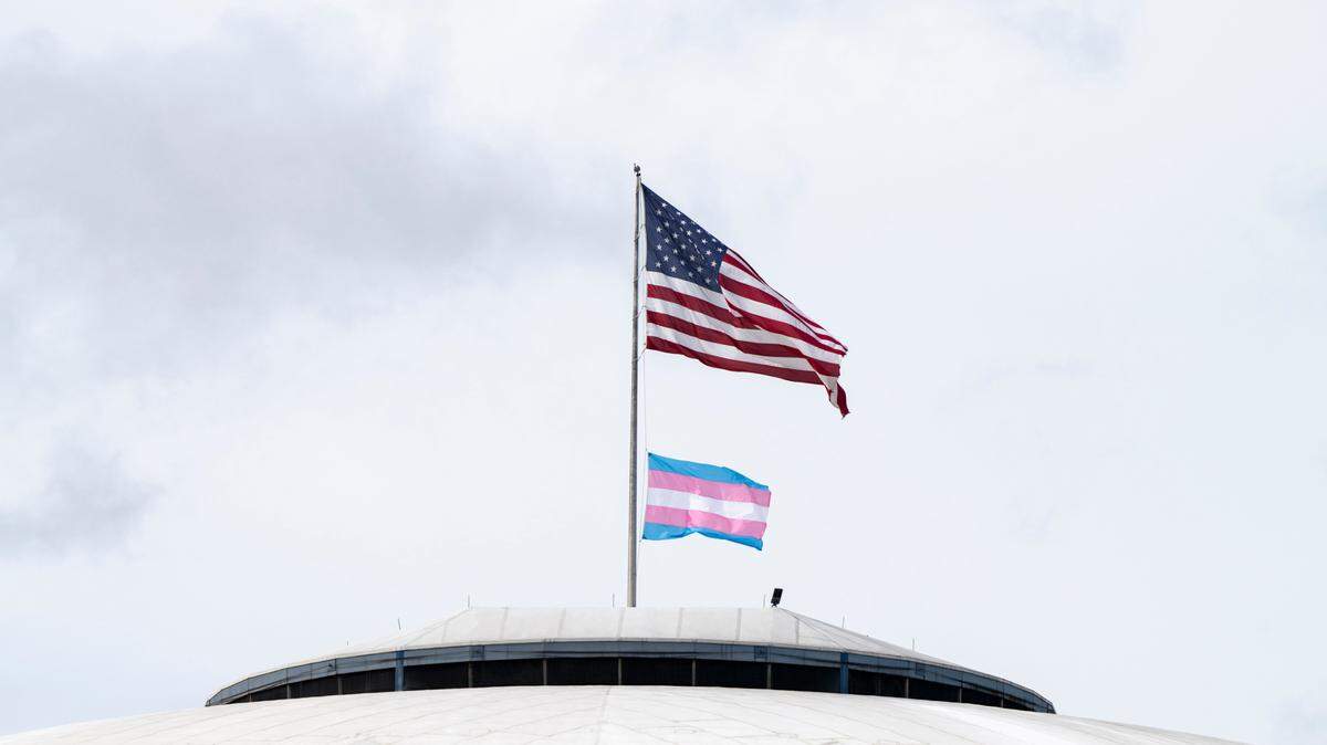 A transgender pride flag waves in the wind atop the Tacoma Dome, on Monday, March 31, 2025, in Tacoma, Wash.