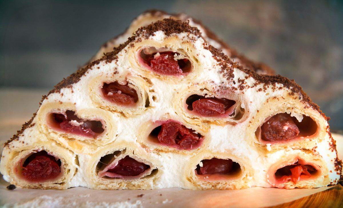 The Monastery Hut is a dessert that is a mix of pie and cake, flavored with sour cream, chocolate and sour cherries at the Pie Style Bakery in Auburn on Thursday, July 8, 2021.