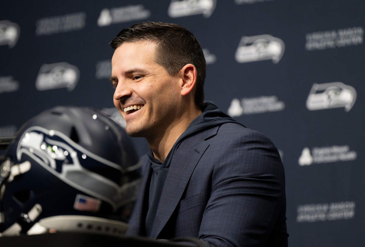 New Seahawks head coach laughs during his first press conference as head coach at Virginia Mason Athletic Center on Thursday, Feb. 1, 2024, in Renton, Washington.