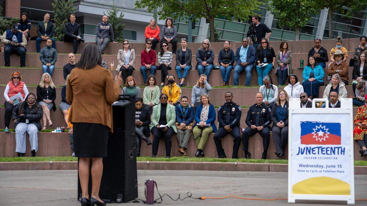 People listen to Mayor Victoria Woodards speak at the 2022 Juneteenth event at Tollefson Plaza in Tacoma. This year’s event will take place June 15.