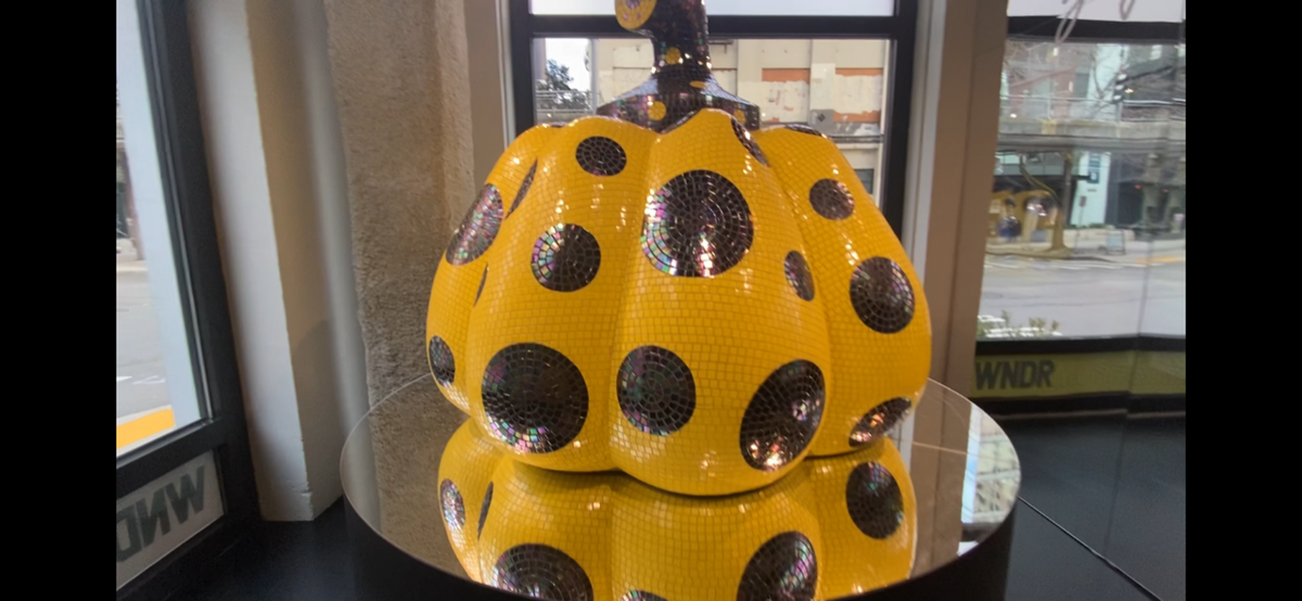 One of Japanese artist Yayoi Kusama’s trademark gourds is on display at WNDR Seattle.