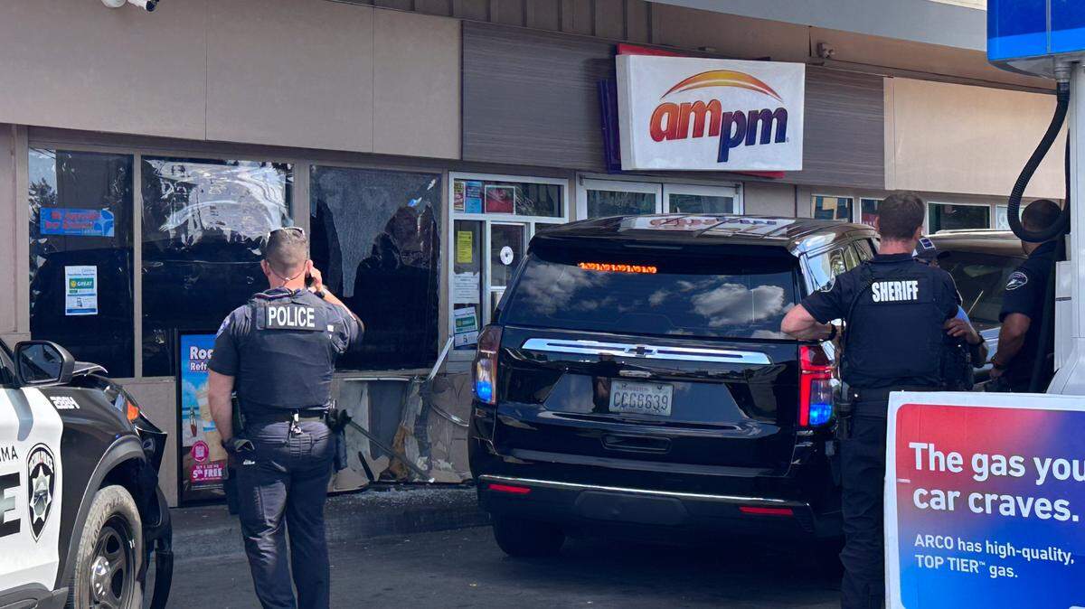 A wanted fugitive rammed his car into a mini mart in Tacoma on Thursday, July 27.