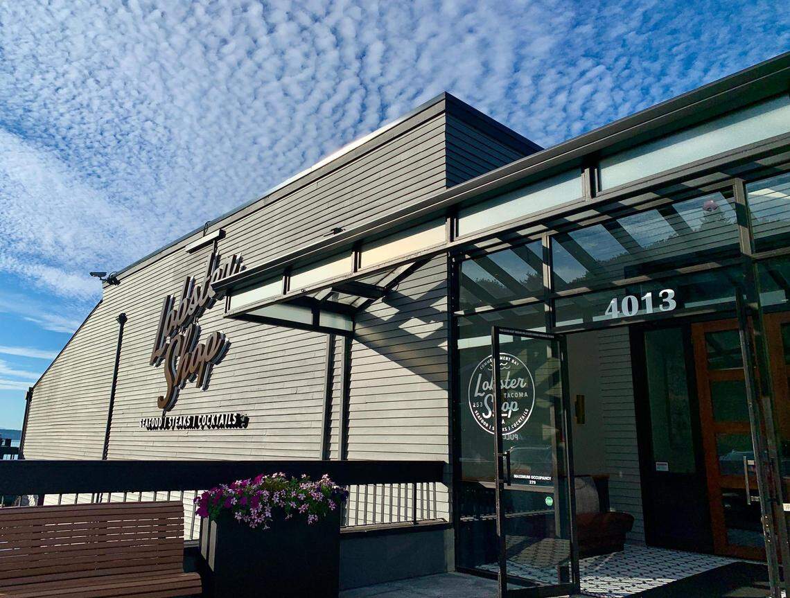 “You basically just feel like you’re sitting on water, right?” said Jim Rowe. The entrance to Lobster Shop pulls guests straight over Commencement Bay, shown here on a sunny day in August 2023, shortly after the reopening.