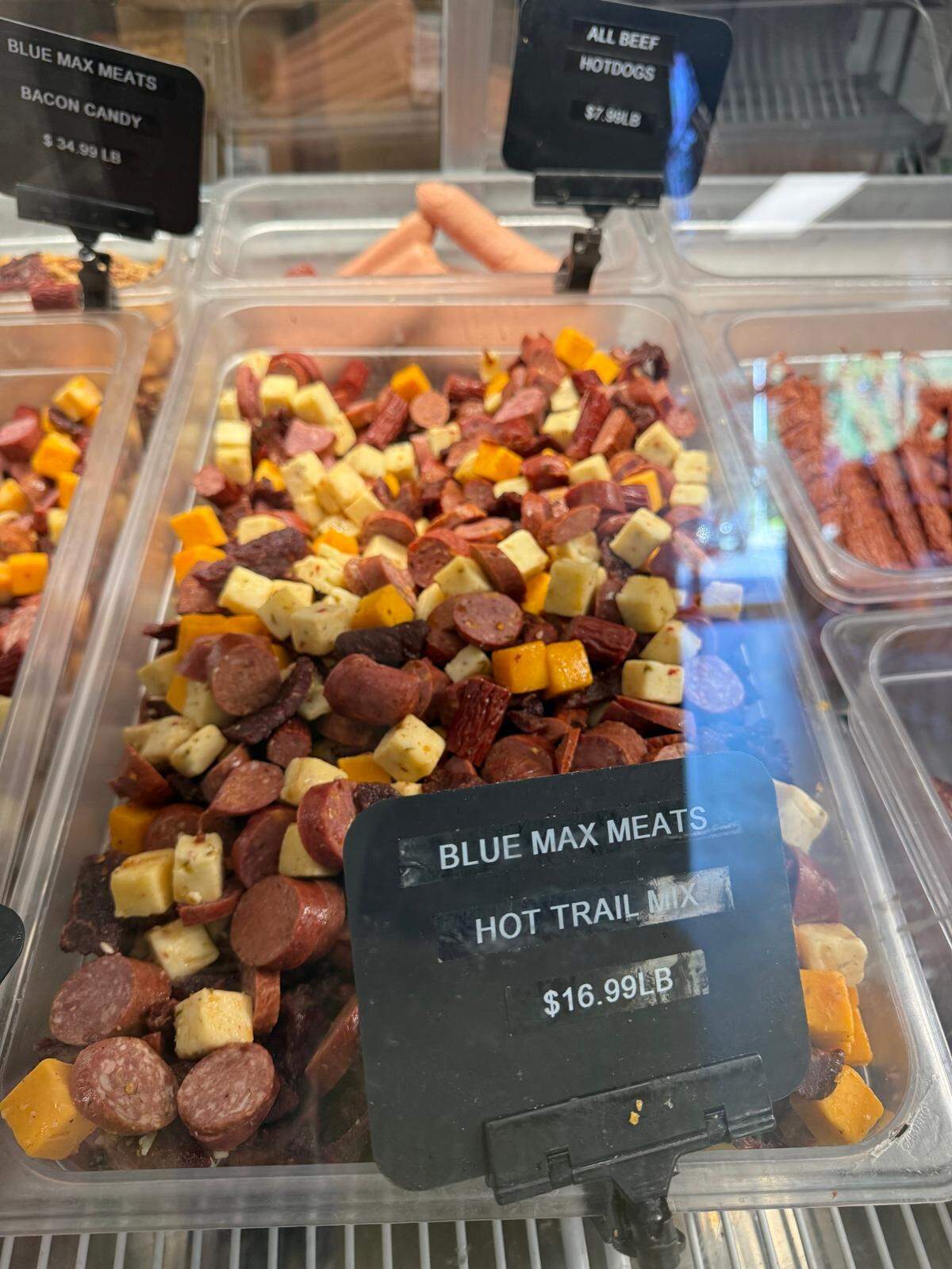 A huge tub of the orginal Blue Max Meats trail mix in the case at Blue Max Meats Puyallup location, on Friday, May 23, 2025, in Puyallup, Wash.