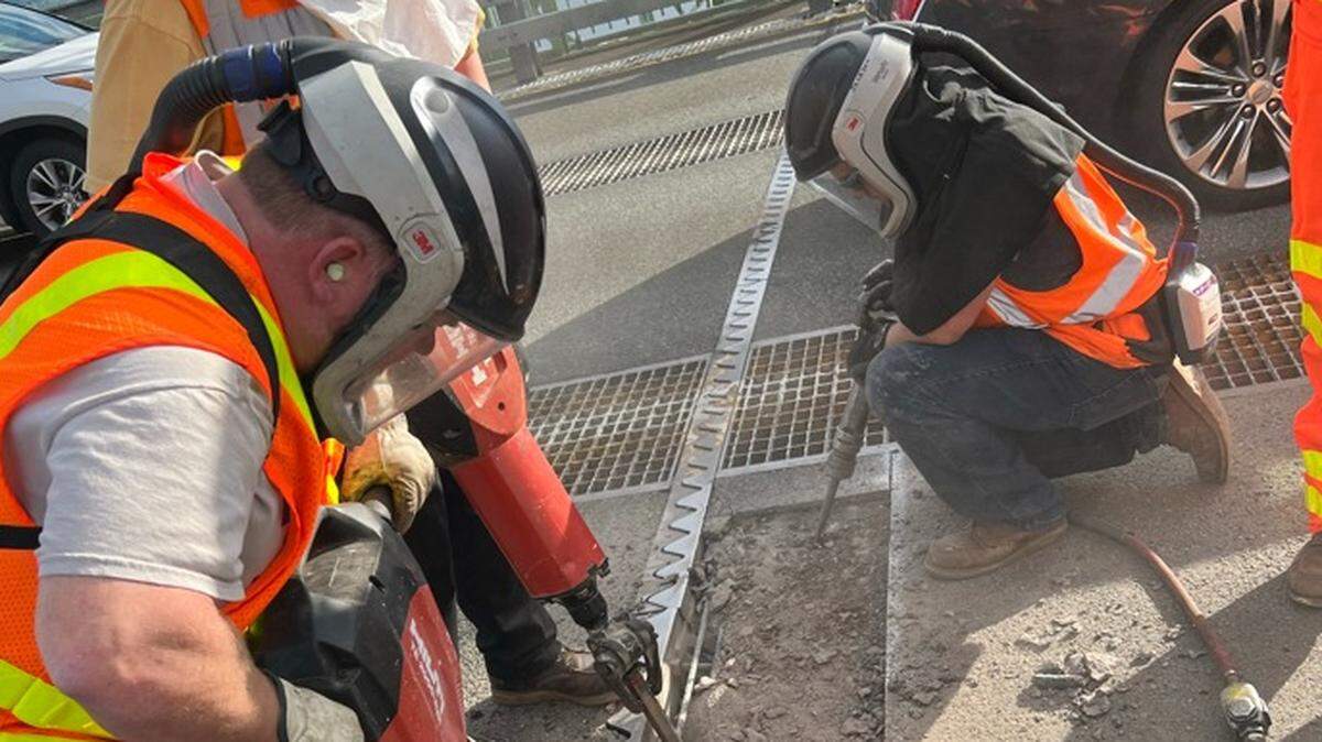 Washington State Department of Transportation crews make emergency repairs on the westbound Tacoma Narrows Bridge in May 2024.