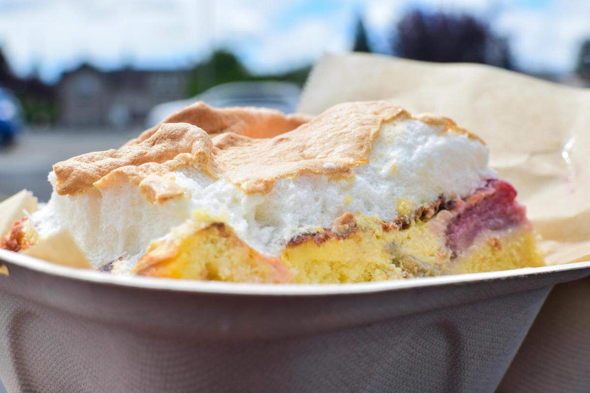 The rhubarb pie is topped with a layer of meringue.
