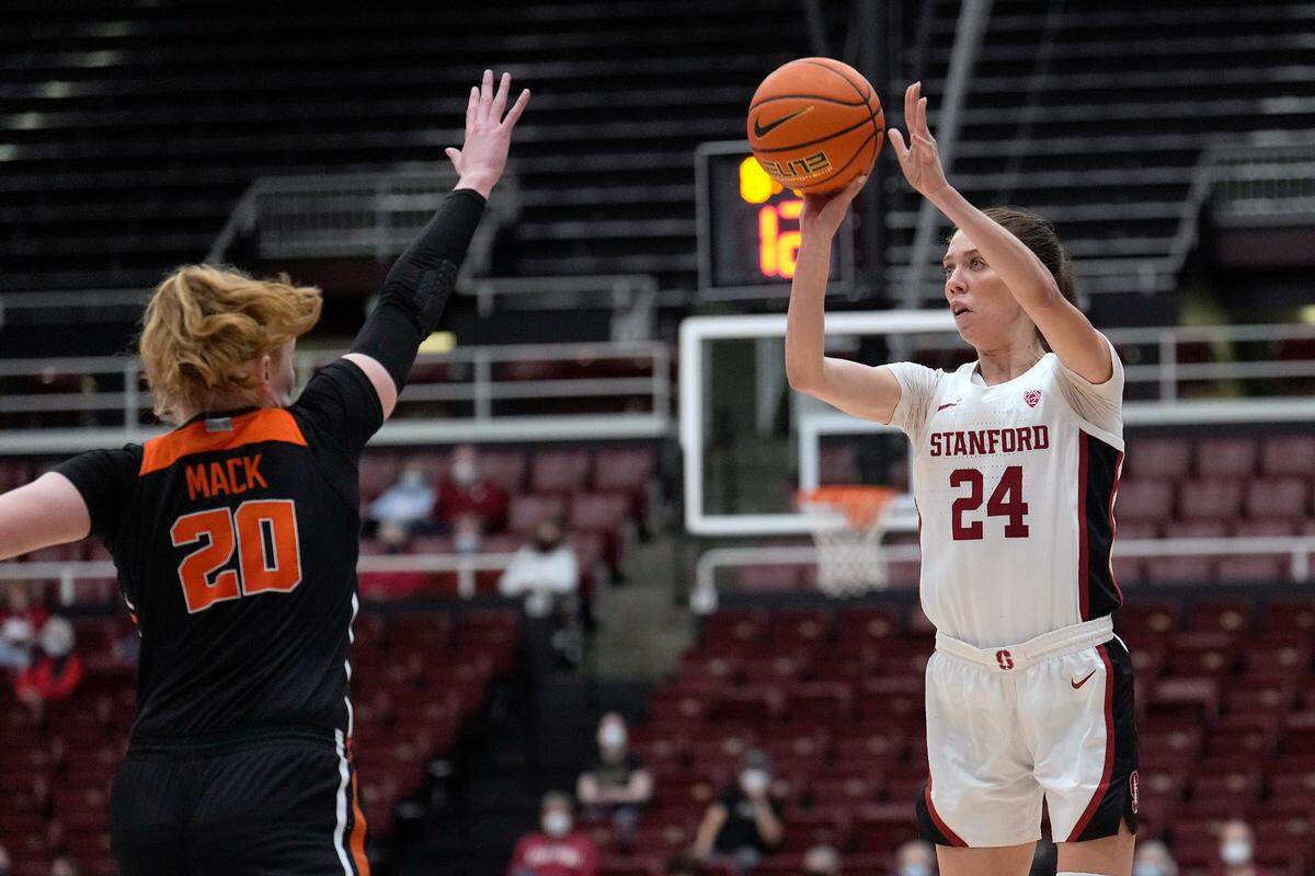 Stanford guard Lacie Hull (24) shoots over Oregon State forward Ellie Mack (20) during the second half of an NCAA college basketball game in Stanford, Calif., Wednesday, Feb. 9, 2022. Stanford won 82-59. (AP Photo/Tony Avelar)