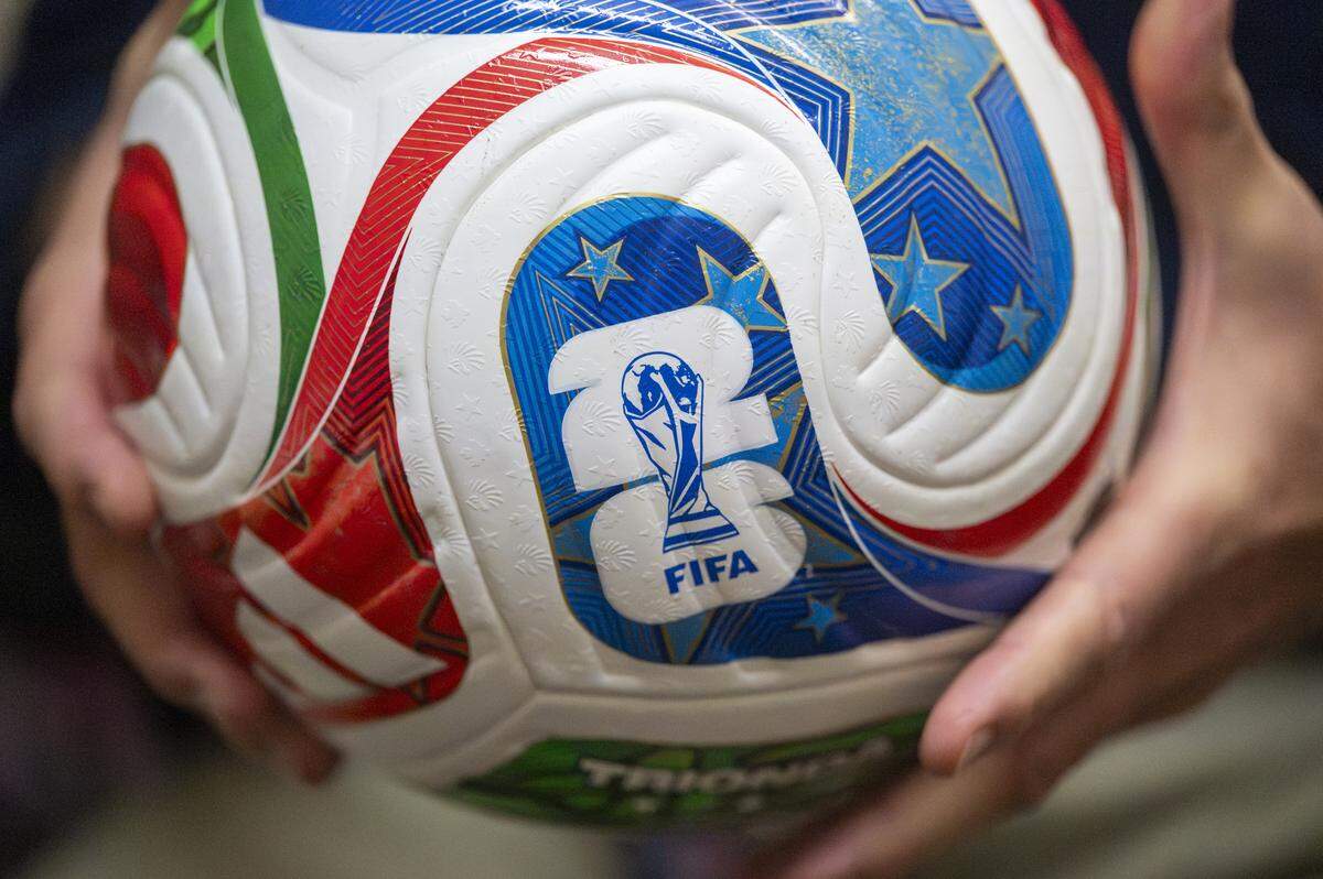 Professor John Eric Goff holds the Trionda ball, which will be used in next year’s FIFA World Cup on Wednesday, Oct. 29, 2025, at the University of Puget Sound in Tacoma, Wash.