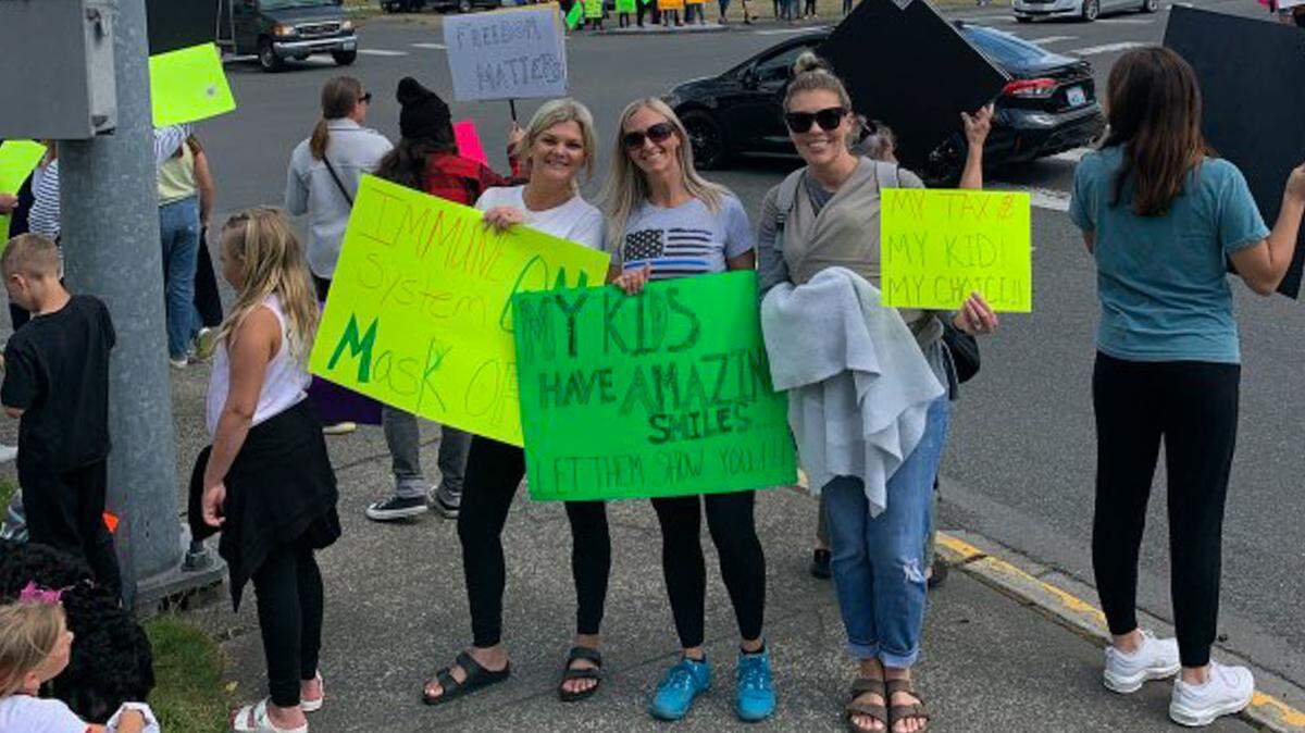 People protest school mask mandates in Sumner on June 7.