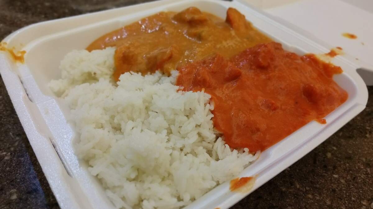 Basmati rice, butter chicken and korma chicken from Lotus Grill Indian Kitchen from South Hill Mall.