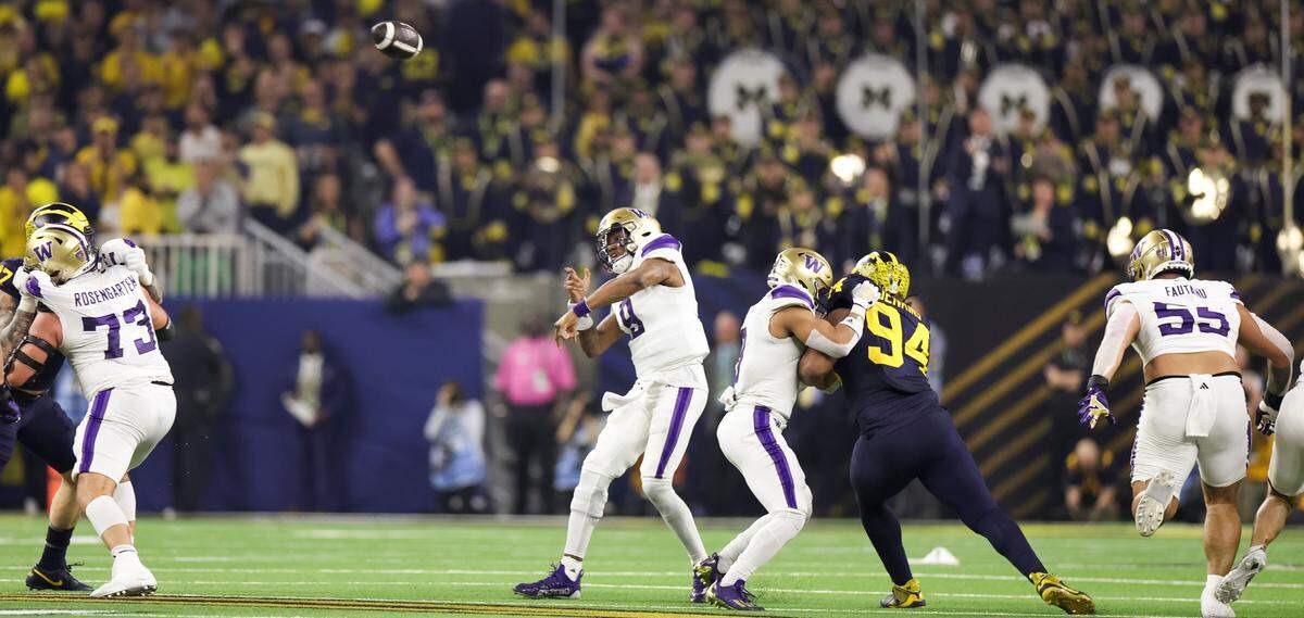 Washington Huskies quarterback Michael Penix Jr. (9) throws the ball during the second quarter of the College Football Playoff National Championship game against the Michigan Wolverines at NRG Stadium on Monday, Jan. 8, 2024, in Houston.