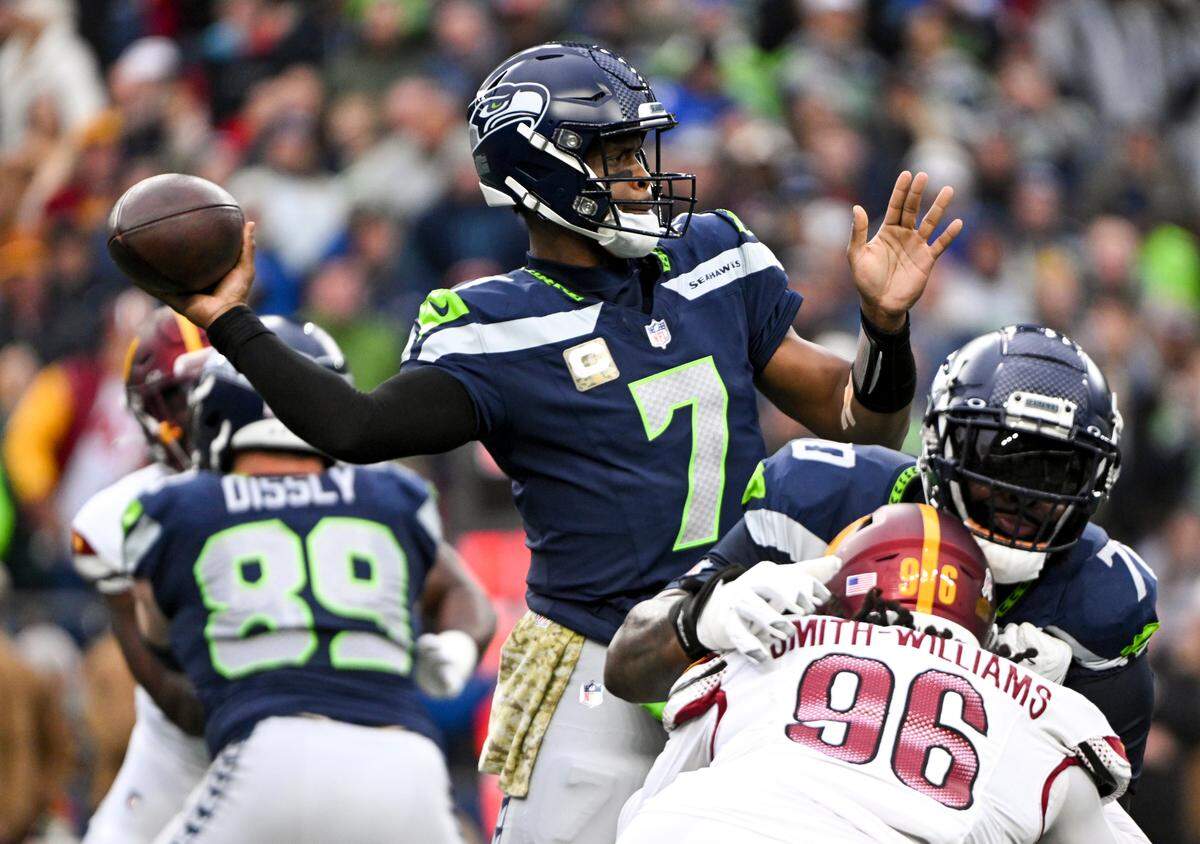 Seattle Seahawks quarterback Geno Smith (7) passes the ball during the second quarter of the game against the Washington Commanders at Lumen Field, on Sunday, Nov. 12, 2023, in Seattle, Wash.