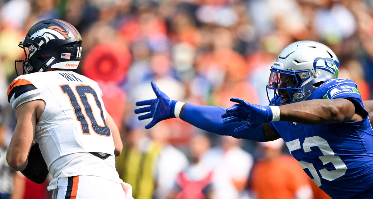 Seattle Seahawks linebacker Boye Mafe (53) pressures Denver Broncos quarterback Bo Nix (10) during the first quarter of the game at Lumen Field, on Sunday, Sept. 8, 2024, in Seattle, Wash.