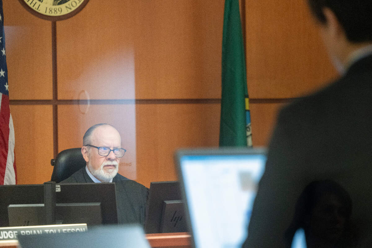 Judge pro tem Brian Tollefson, left, presides over the arraignment of Ronald Thomas Stephens, 35, at Pierce County Superior Court on Thursday, April 24, 2025, in Tacoma. Stephens has been charged with the fatal stabbing of his 65-year-old mother.