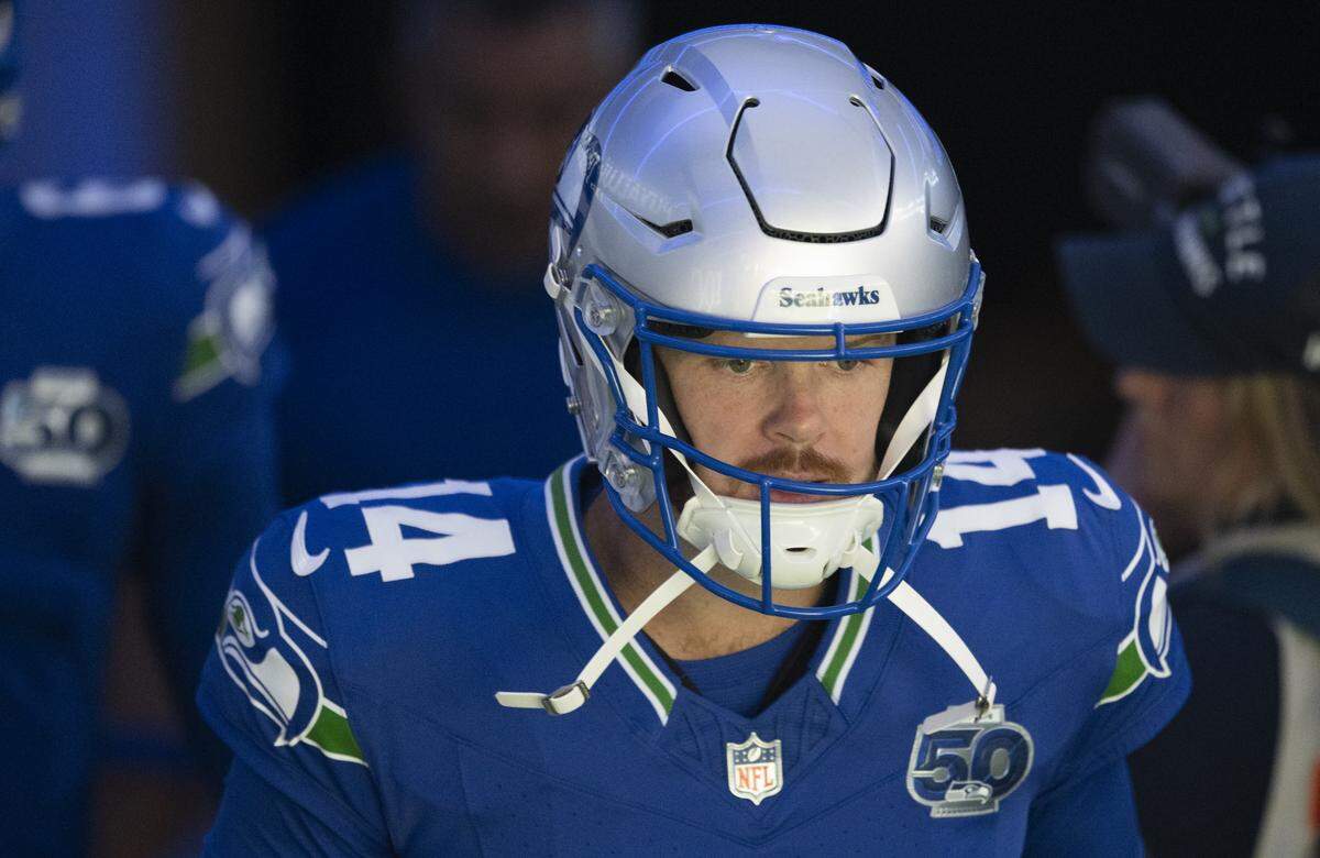 Seattle Seahawks quarterback Sam Darnold (14) runs out before the game against the Tampa Bay Buccaneers at Lumen Field, on Oct. 5 in Seattle.