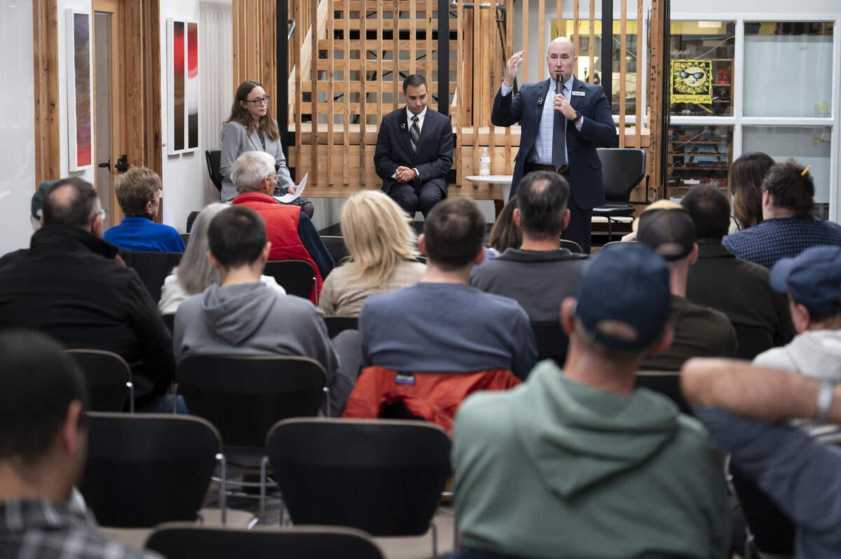 News Tribune opinion editor Laura Hautala, left, moderates a mayoral candidate forum with Anders Ibsen, center, and John Hines, right, on Monday, Oct. 13, 2025, in Tacoma.